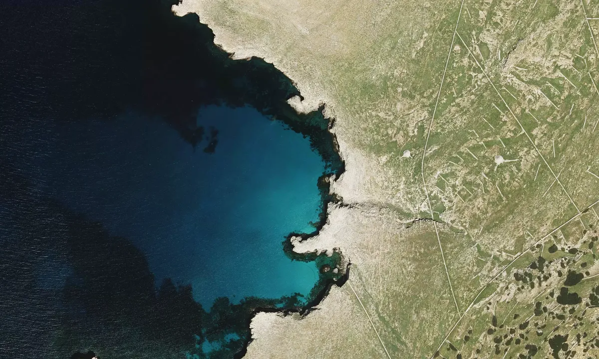 Flyfoto av Cala del Amarrado