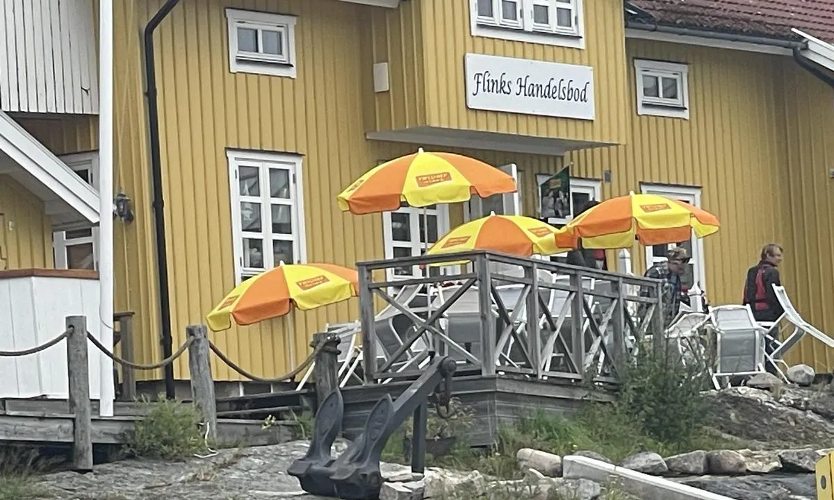 Flatön - Handelsman Flink: {"base": "se", "no": "\u201eFlinken\u201c.", "se": "\u201dFlinken\u201d.", "en": "\"The Nimble.\"", "da": "\u201dFlinken\u201d."}