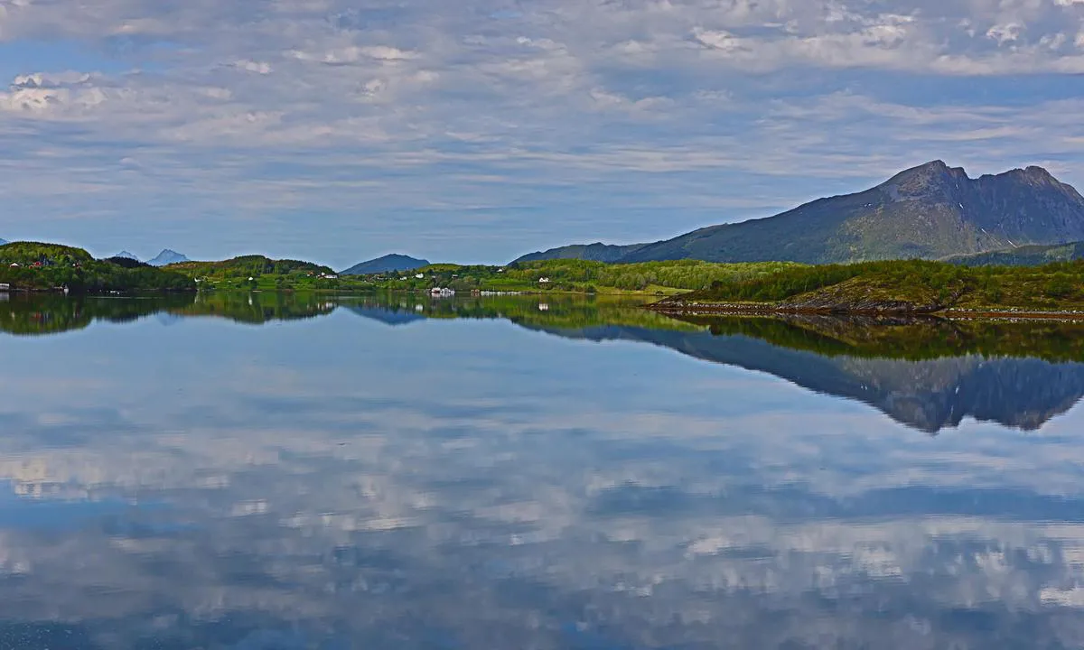 Innerpollen: View south west to Røtnes. The mountain Sætertinden in the background to the right.