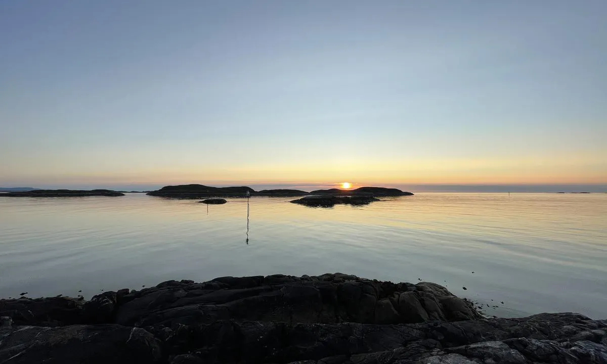 Sandøy: Solnedgang fra moloen